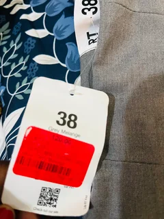 Pleated mini suiting grey . Free delivery in town