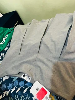 Pleated mini suiting grey . Free delivery in town