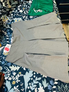 Pleated mini suiting grey . Free delivery in town