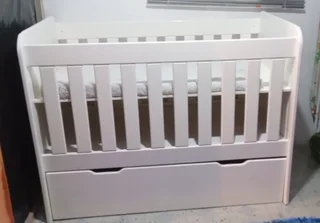 Wooden cot with draw