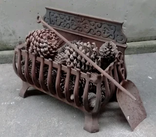 Vintage cast iron grate for fireplace