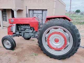 Massey Ferguson 188 Trekker met 2 Skaar Ploeg / Tractor with 2 Disc Furrow Plough for Sale (014514)