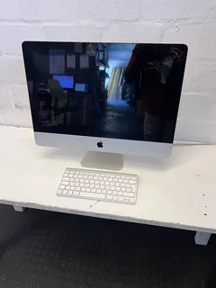 Apple iMac Desktop Computer intel core i5 4GB RAM with Silver Finish and Wireless Keyboard- A56060