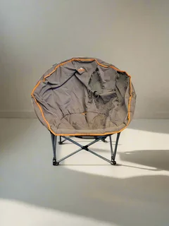 Cozy Grey Collapsible Lounge Chair with Orange Accents – Modest Wear- A55596