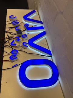 Modern Blue Neon Sign – VIVO – Wall Decor with Minor Wear- A55339