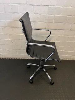 Sleek Black Office Chair with Chrome Accents – Minor Wear- A55245