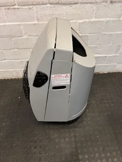 Compact DeLonghi Silver Heater with Minor Scratches - PRICE DROP- A52760