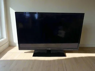 32-inch LED TV - Slim Black Design with Minor Scratches- A54859