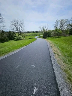 TAR ASPHALT SURFACING