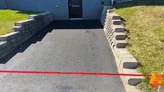 TAR ASPHALT SURFACING