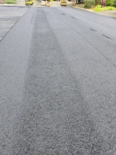 TAR ASPHALT SURFACING
