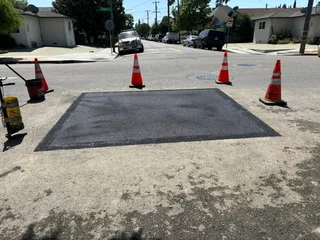 TAR ROADS N DRIVEWAYS