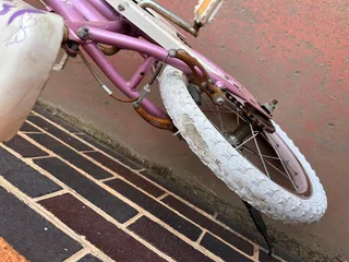 Pink and purple young girl&#39;s bicycle