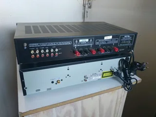 Rotel RA-930AX stereo integrated amplifier with Rotel multdisic changer