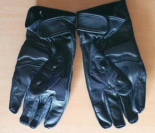 DMD leather motorcycle gloves. Size XL. As new. R450  ( New Price R1250). Collection in Port Elizabe