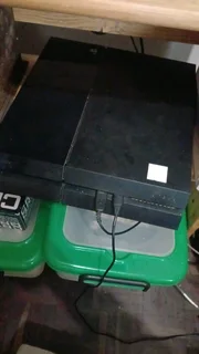 Ps4 1TB console with games and remotes