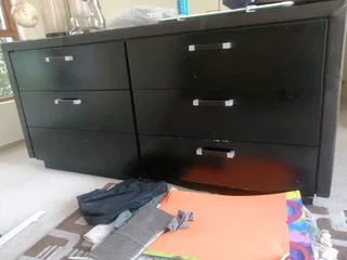Chest of drawers and mirror