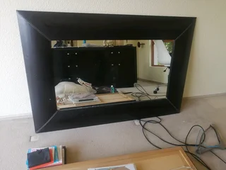 Chest of drawers and mirror