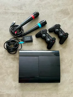 PlayStation 3 Console Bundle + Games + SingStar Mics
