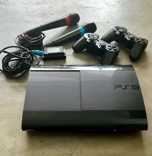 PlayStation 3 Console Bundle + Games + SingStar Mics