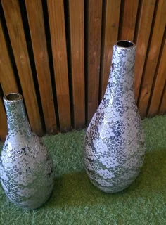 Silver flower printed vases x2 Ref Stock No 3352 Price Only R 200.00 WhatsApp No: 079 011 7918