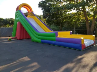 Funfair Rides and jumping castle entertainment