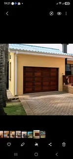 Single Garage Door 5 panels with 2 remotes and all the brackets and fixings