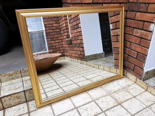 Mirror with gold frame