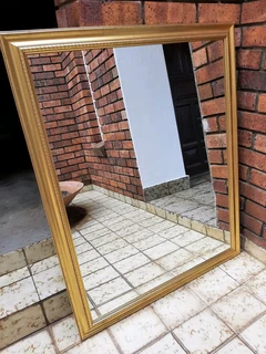 Mirror with gold frame