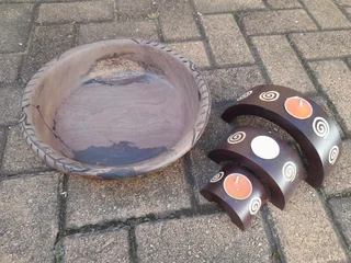 Wooden carved bowl and candle holders
