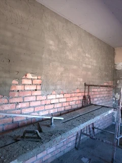 Skilled builder, plaster, skimmer