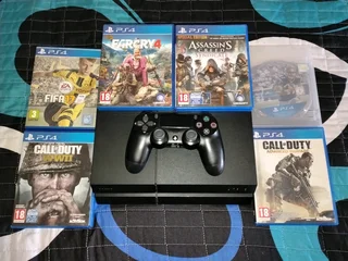 PlayStation 4 with 2 controllers and 6 games