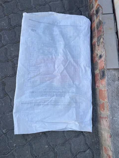 Empty 25kg plastic flour bags