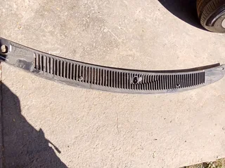 Mazda 323 wiper cowling