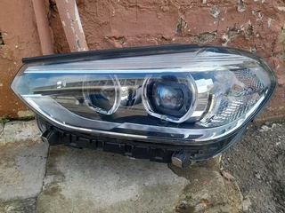 BMW X3 left side xenon headlight/head light for sale