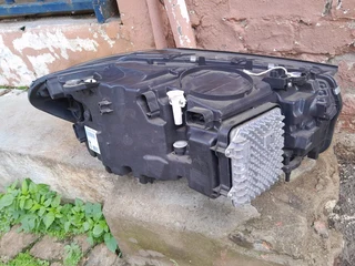 BMW X3 left side xenon headlight/head light for sale