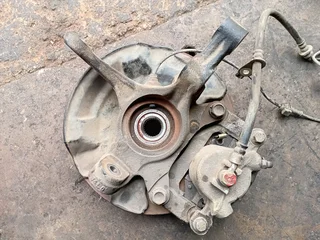 Suzuki Ciaz left side Brake Caliper, Hub (stub axle and bearing) and Brake Disc for sale
