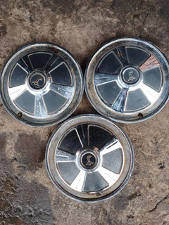 Datsun 240c 260c  Steel Hub Caps. Black Silver