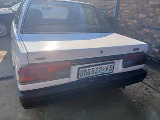 NISSAN SENTRA BOX SHAPE 1500 E25 FOR STRIPPING FOR SALE CALL FOR INFO