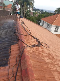 High pressure cleaning of roof,gutters,walls and paving