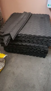 Used and new interlocking PVC tiles