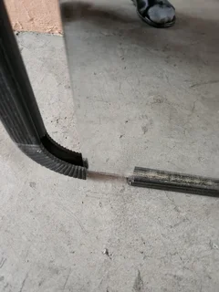 Mirror with cracked plastic frame