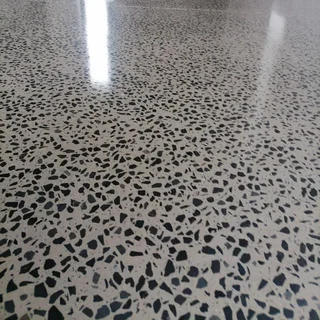 Grinding and polishing of concrete floors