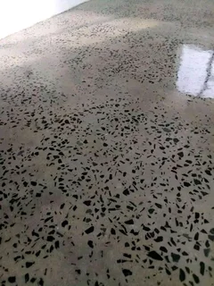 Grinding and polishing of concrete floors