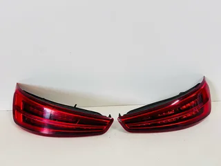 Genuine OEM 2016–2018 Audi Q3 Rear Left and Right Taillights.