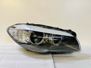 2009–2013 BMW 528i / 535i / 550i (F10 F11) Right Driver Side Xenon Headlight – Genuine OEM
