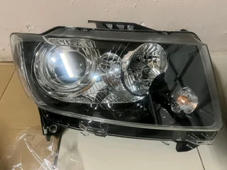 Headlight for Jeep Grand Cherokee