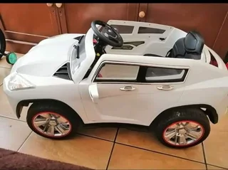 Kids ride on car and tractor