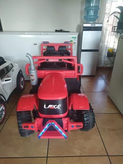 Kids ride on car and tractor