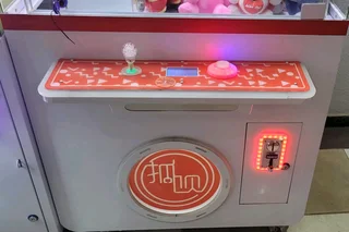 Crane claw teddy bear machine